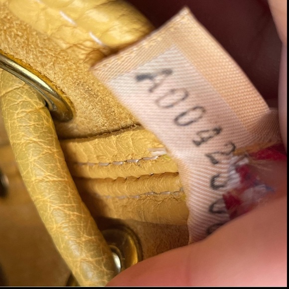 Dooney and Bourke AWL leather Palomino Yellow mini drawstring bucket bag purse - Picture 13 of 16